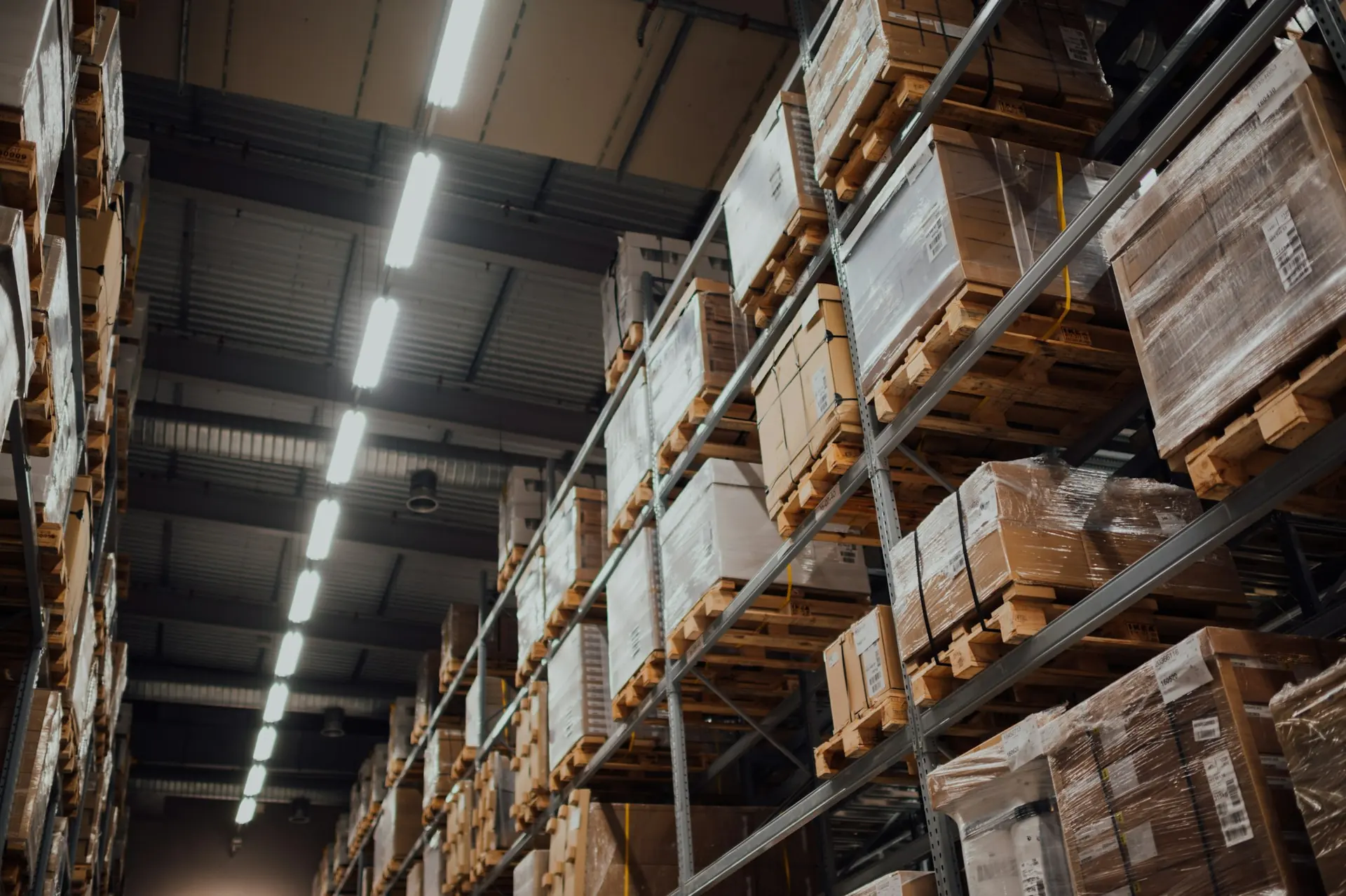 Warehouse shelves stacked with boxes